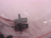 Honeywell HOA1881-013 optoswitch sensor body close-up showing part number label and Mexico origin marking, with pigtail wires
