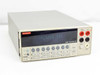 Keithley 2000 6.5-Digit Multimeter – front panel view with VFD display lit reading '-0025086 VDC', function buttons and input terminals visible
