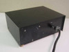 Homebrew bench power supply rear view – black steel enclosure with 2 AMPS label, AC power cord exit, minor surface scuffs