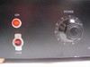 Close-up of front panel left side – illuminated red ON pilot lamp and LINE toggle switch in OFF position, POWER rotary knob