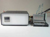 Custom heat sealing machine with Omega CN4400 controller enclosure on left and aluminum sealing head assembly on right — HOT warning label visible on sealing element
