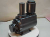 ULVAC D-950 Oil Rotary Vacuum Pump front-left view showing pump body, two cylindrical oil reservoirs, and belt drive pulley