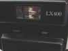 Polaroid Laminex LX400 front top detail showing built-in flash, LX400 model label, and COLOR / B&W mode indicators