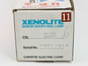 Christie Xenolite box label showing model CXL 3000, serial number AG011014, and Christie Electric Corp branding