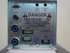 Amray 124-002 Ion Pump Power Supply lower module front panel — close-up showing dual blue HV connectors, DANGER HIGH VOLTAGE -5KV warning label, green terminal blocks, and fuse holder