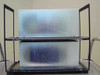 Amray 124-002 Dual Ion Pump Power Supply — both modules removed from case and displayed side by side showing front panel layout