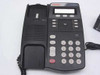 Avaya 4606 IP Office Phone close-up front panel showing LCD display, feature buttons, and keypad