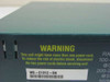 Cisco WS-C1912-EN model number label and warning sticker on side of Catalyst 1900 switch chassis