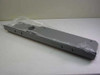 APC AR8111 stabilizer plate — side profile view of gray metal plate still in sealed plastic packaging