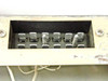 RCA MI-560772 Raw DC Power Supply — terminal strip connection block visible through chassis opening, showing multiple screw terminals