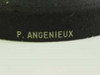 Close-up of P. Angenieux lens hood base showing engraved brand name P. ANGENIEUX