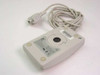 Logitech M-CE15 serial mouse – bottom view showing ball housing, rating label, four rubber feet, and UL/CSA markings