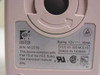 Logitech M-CE15 serial mouse – close-up of bottom label showing model number, FCC ID DZLMCE15, 12V 10mA rating, and Made in Taiwan