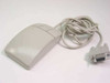 Logitech M-CE15 3-button serial ball mouse – top/front view showing beige body, three buttons, and attached cable with DB9 connector