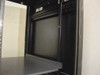 Winstead rackmount cabinet upper interior close-up showing rack rail mounting strips and installed shelf from side angle