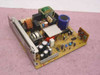 HP RH3-2195 power supply board – angled three-quarter view showing full board layout with capacitors, transformer, and bracket