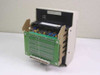 Data I/O 303A-002 interior view with housing open — large green PCB with dense pin grid array and parallel edge connector visible