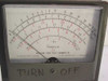 Simpson 311 VTVM close-up of multi-scale analog meter face showing voltage and resistance scales, DC input resistance 22 megohms notation
