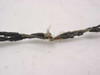 Close-up of Simpson 311 test lead cable showing severely cracked and deteriorated insulation with inner conductor exposed at a break point