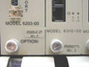 Close-up of module faceplates showing Model 6203-00 label with P/N 0500042129 Rev. F and Model 6312-00 label with P/N 0500002773 Rev. D