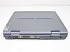 NEC Versa LXi VM4FBEA – rear edge closed view showing PS/2, DB9 serial, DB25 parallel, and DB15 VGA ports plus speaker grille and power jack
