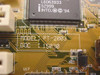 FIC PT-2003 PCB close-up showing Intel chipset markings (L6063933 SZ999, © 1994), model number PT-2003, and DOC 15030 silkscreen