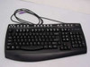 Nexxtech NXX6000 Enhanced Keyboard — full top view showing contoured layout, multimedia hotkeys along top edge, and attached PS/2 cable