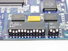 Close-up of Madge ISA Token Ring card DIP switches SW1 and SW2 with AMP 2-435802-2 connector and Texas Instruments ALS541 logic ICs visible