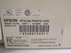 Epson Stylus Photo 1270 rating label showing Model P153A, 120V 50-60Hz 0.4A, serial number, UL/CSA/FCC certifications, Made in Japan