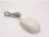 Kensington 64206B Mouse-in-a-Box ADB 1-button mouse — top/side view showing beige body and ADB cable