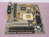Asus SPAX-M Socket 7 system board – top-down view showing SPAX-M silkscreen, Socket 7 ZIF socket, SIMM slots, PCI slots, ISA slots, and integrated chipset IC