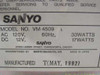 Close-up of Sanyo VM 4509 L rating plate label — model number, AC/DC power specs, Sanyo Electric Co. Ltd., Chatsworth CA address, manufactured May 1992, made in Japan