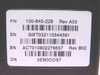 Close-up of EMC carrier label showing PN 100-845-228 Rev A05, SN SMT032110344391, BN ACT010802276657 Rev B02, DN 3EM0DDS7