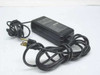 Toshiba PA2408U AC adapter front view showing black brick body with attached US 2-prong power cord