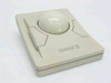 Kensington 62360 Turbo Mouse ADB trackball — top view showing large cream ball, two recessed buttons, and Kensington logo on beige housing