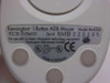 Kensington 64206 1-Button ADB Mouse – bottom label showing Model 64206, FCC ID GV364101, serial 6MB220205, UL and CE markings, Made in Malaysia