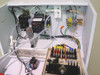 SPEC SBX 1.5-30 – internal electrical cabinet showing wiring, terminal blocks, relay modules, and control components
