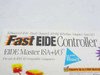 Close-up of SIIG Fast EIDE Controller box label reading Enhanced IDE Dual Channel 16-Bit ISA-Bus Adapter with I/O, EIDE Master ISA+I/O, for IBM AT-Compatible Computers, supports up to 4 EIDE devices