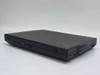 IBM ThinkPad 2611-472 laptop closed showing top lid and IBM logo badge — left side and PC Card slots visible