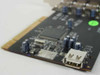 Close-up of CompUSA PCI-USBNEC101-5P-2 PCB showing NEC controller chip, capacitors, and internal USB header connector