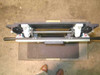 Gravity hoist assembly – top-down view showing THK FBW50110R linear slide carriage, Thompson SSUPBO 8 pillow blocks, cross-shaft, and chain drive components