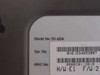 D-Link DI-604 bottom label close-up showing model DI-604, serial number BN01534053997, MAC 0080C8113819, H/W E1, F/W 2.18