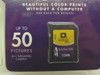 Lexar Media 32MB SD Digital Film Card close-up showing card label with SD and 32MB markings and picture capacity chart