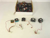 Assorted generic 486 and Pentium CPU cooling fans in a cardboard box, with five individual heatsink fans displayed in front showing varied styles and Molex connectors