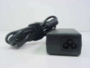 Compaq PP2012 AC Adapter – end view showing 3-pin IEC C6 cloverleaf AC input connector with cord coiled