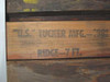 Close-up of Tucker Mfg stamp on wood ridge beam tent pole reading 'U.S. Tucker Mfg – Ridge 7 FT'