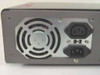 AT&T Merlin Mail MM04 — rear panel close-up showing cooling fan, IEC AC inlet, and IEC AC outlet