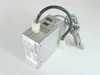 Power Technologies 660.0500 PBX phone system power supply – three-quarter front view showing metal enclosure, output wire harness, and ventilation slots
