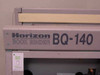 Horizon BQ-140 Book Binder – close-up of front panel nameplate with Power Down sticker attached