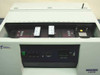 Dynatech Fluorolite 1000 – top lid open showing filter cartridge bay with emission and excitation cartridges installed and detector module